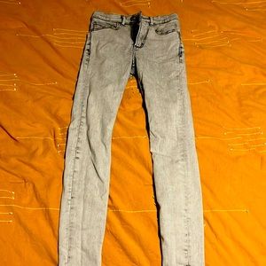 Stone wash grey high rise jetting type jeans